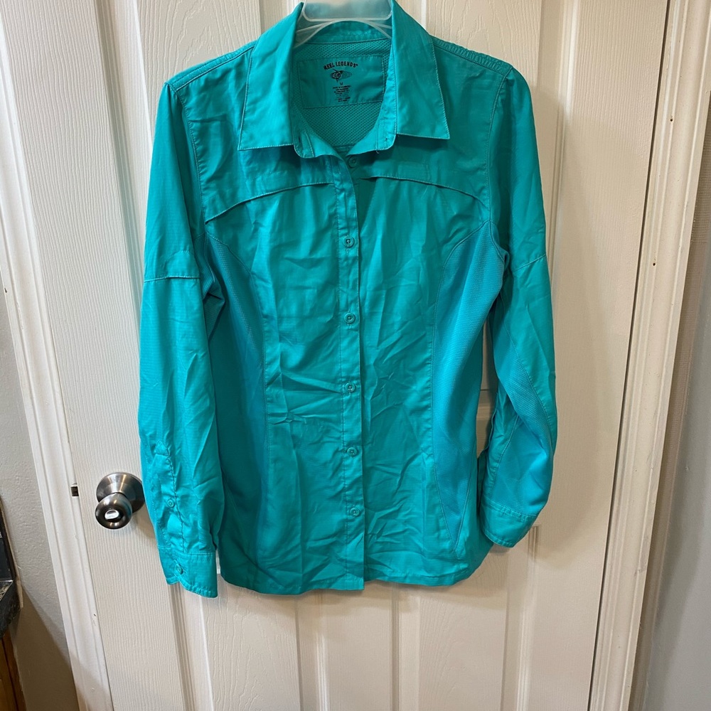 Turquoise blue Reel Legends fishing shirt
